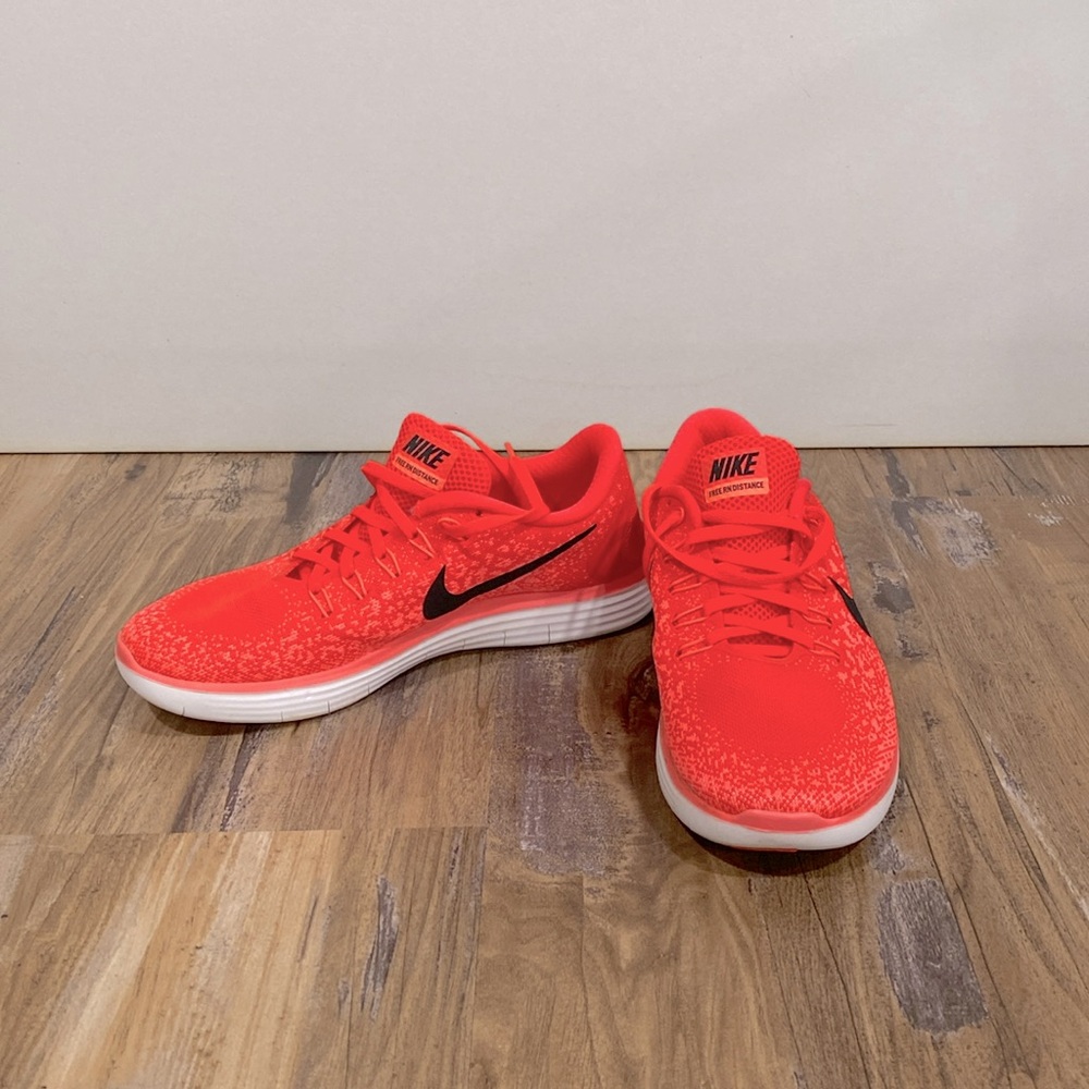 Hot pink/ coral Nike running shoes